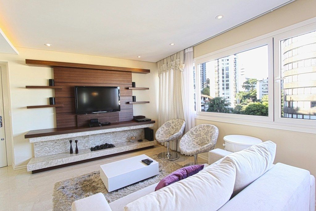 Furnished hall with a TV unit and sofa