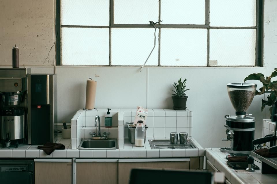 Kitchen with a sink and shelves